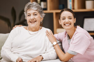 Older woman with younger, female assisted living caregiver